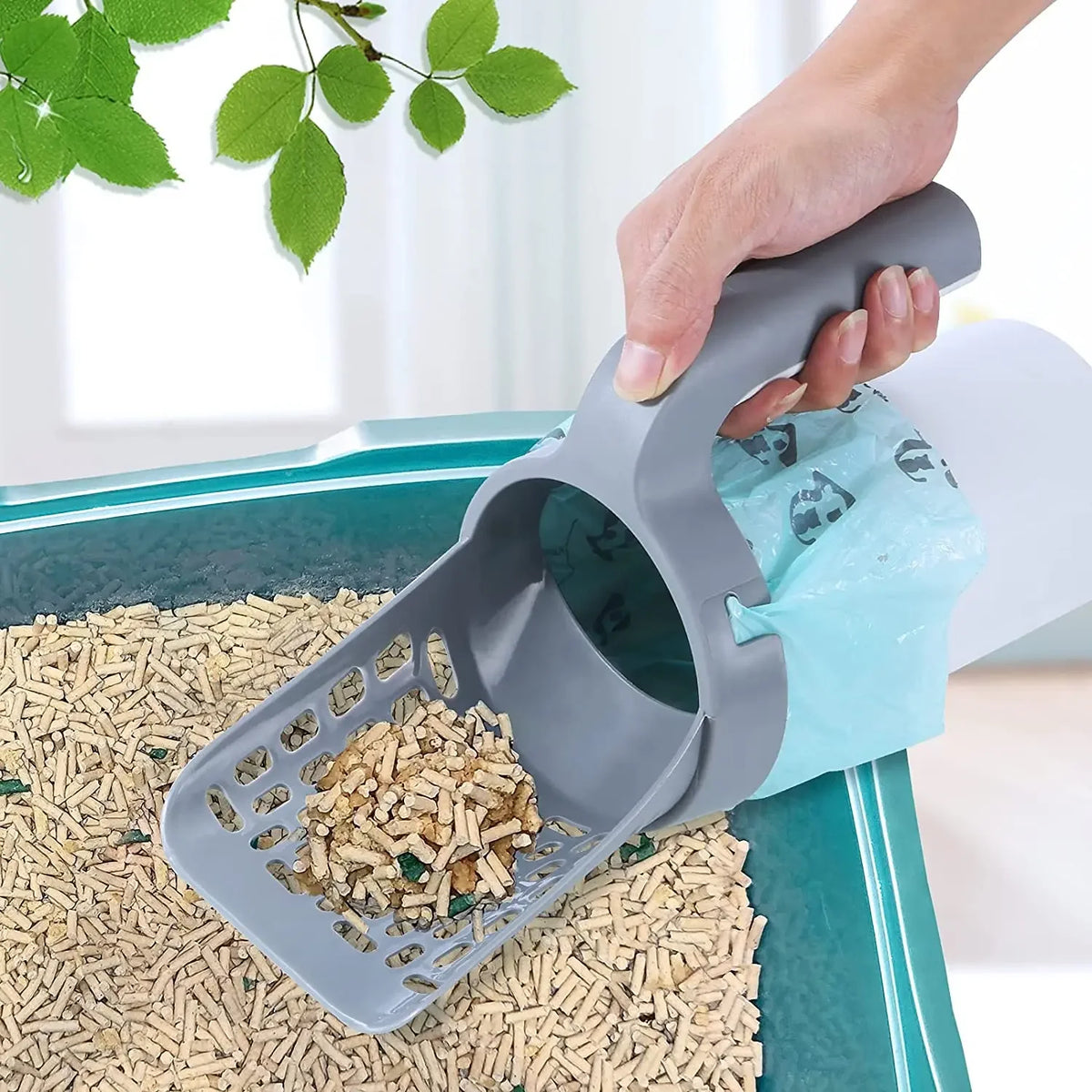 Pala para arena de gato 2 en 1 con dispensador de bolsas integrado